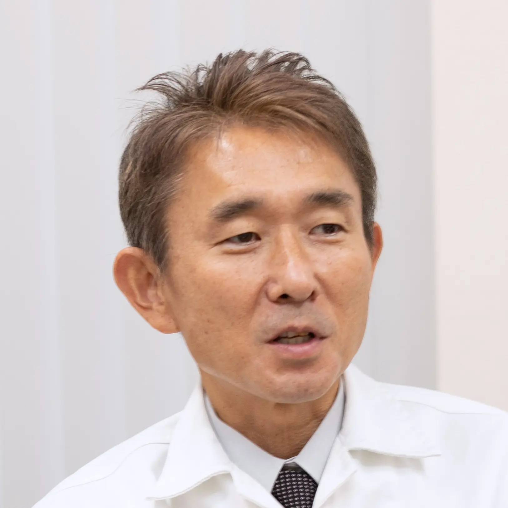 シートのラージプロジェクトリーダーである根岸